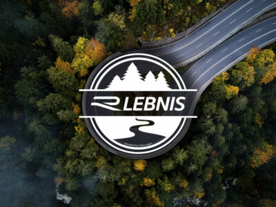 Winding-road-trough-dense-pine-forest